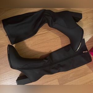 Black and gold boots